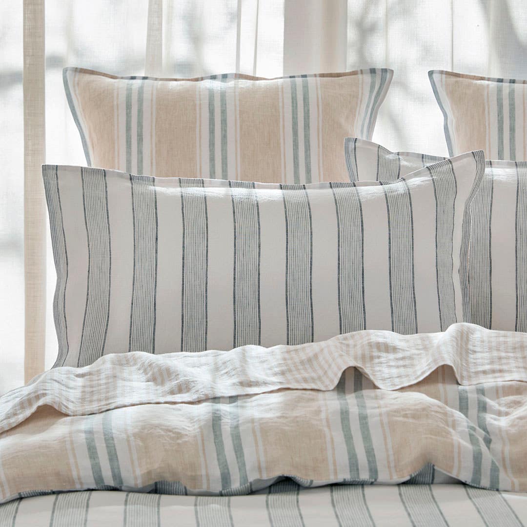 https://s3-ap-southeast-2.amazonaws.com/fusionfactory.commerceconnect.bbnt.production/pim_media/000/197/533/CH_S25-26_LS_Location_Austen_Blue_Stripe_Pillow_SI.jpg?1752546009