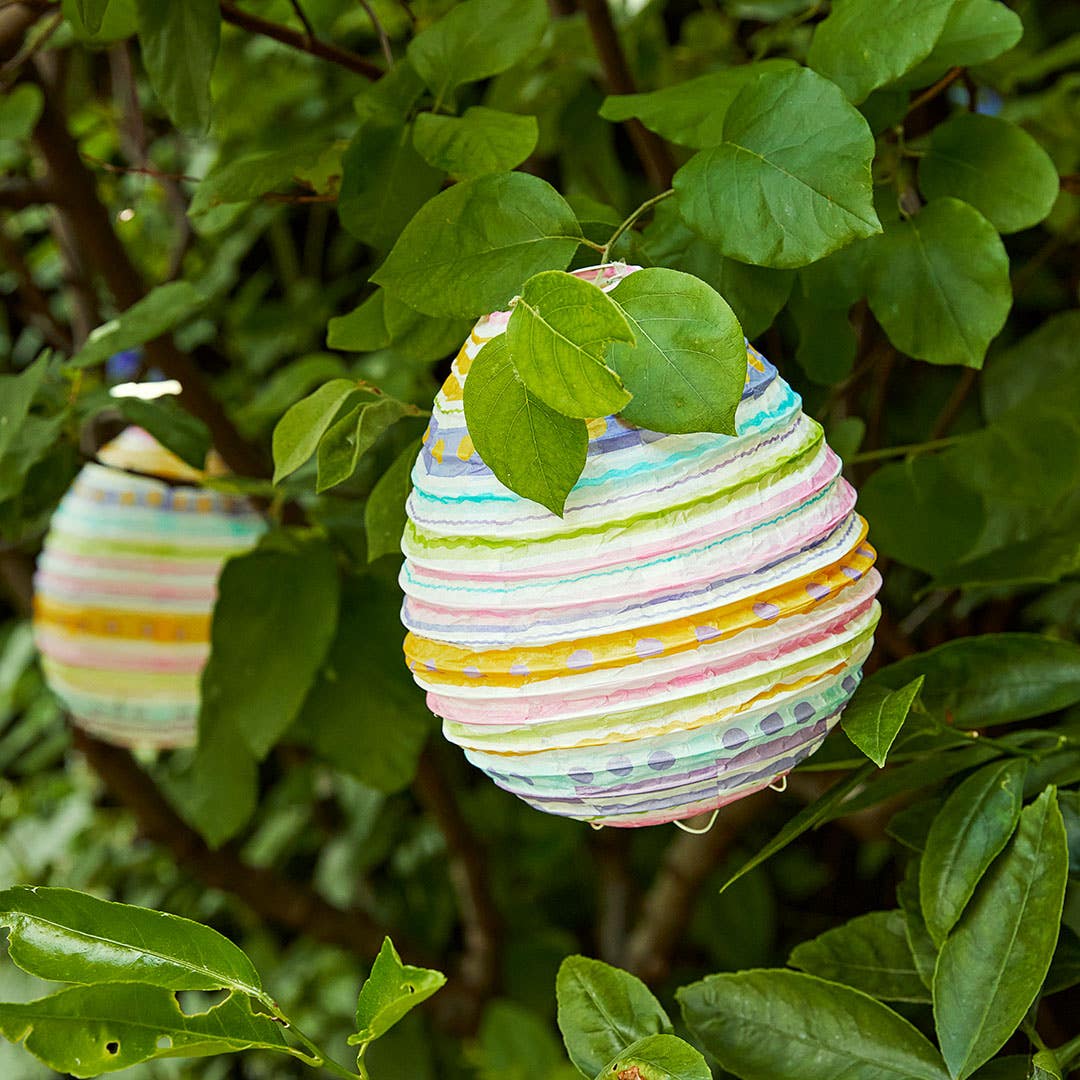 https://s3-ap-southeast-2.amazonaws.com/fusionfactory.commerceconnect.bbnt.production/pim_media/000/156/813/M_F_Easter-24_LS_Egg-Hunt_Egg-Shaped-Paper-Lantern-Stripe-2_SI.jpg?1701909317