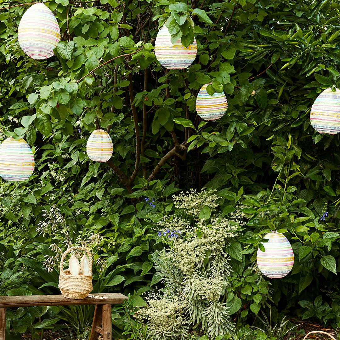 https://s3-ap-southeast-2.amazonaws.com/fusionfactory.commerceconnect.bbnt.production/pim_media/000/156/814/M_F_Easter-24_LS_Egg-Hunt_Egg-Shaped-Paper-Lantern-Stripes-1_SI.jpg?1701909329
