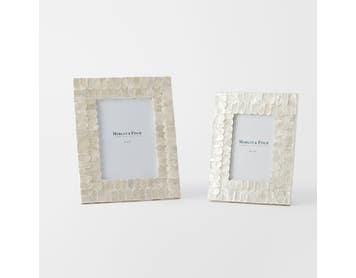 https://s3-ap-southeast-2.amazonaws.com/fusionfactory.commerceconnect.bbnt.production/pim_media/000/169/411/M_F_Issey-Inlay-Photo-Frame-5x7_Ivory_25881601_SI.jpg?1725601904