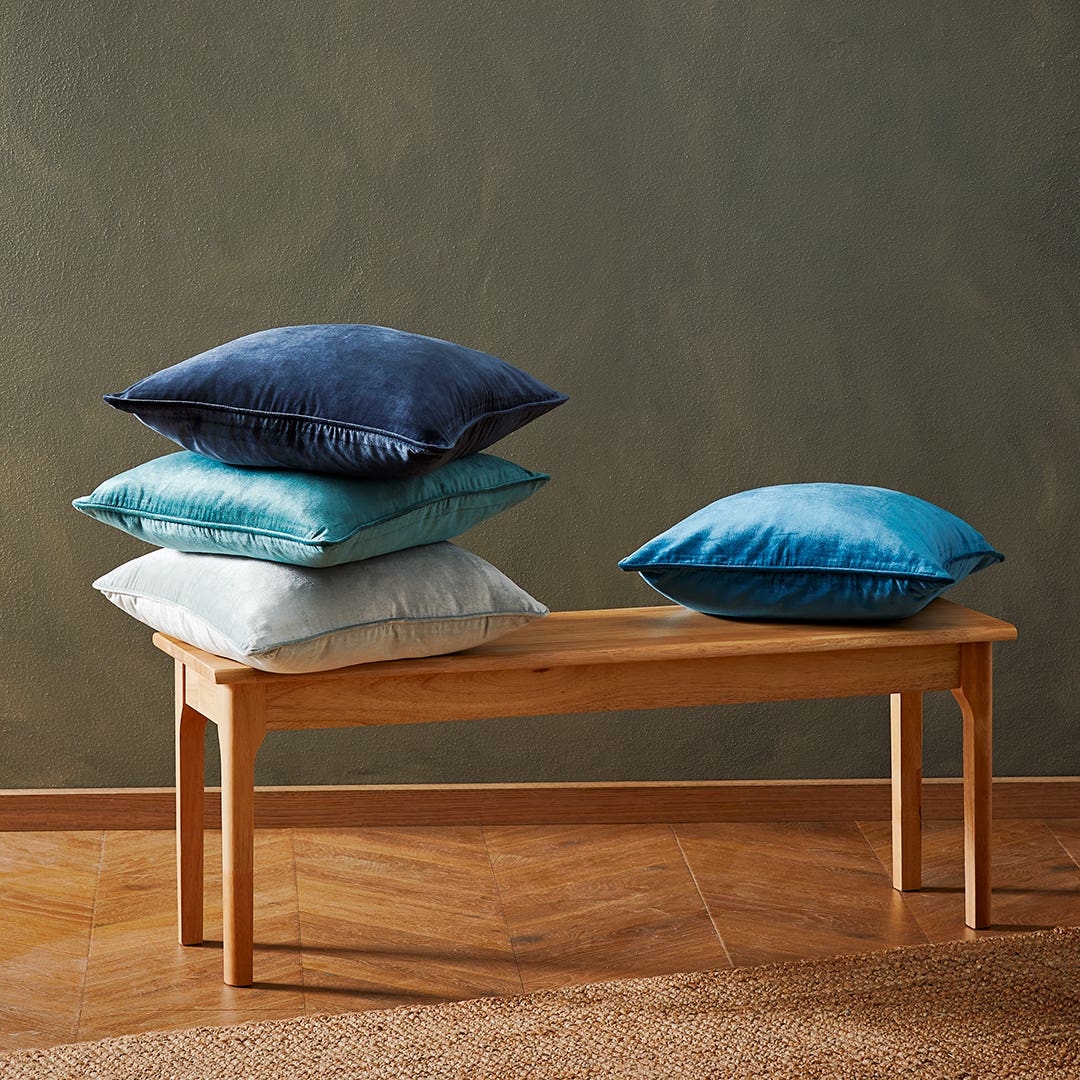 Petrol blue velvet cushions on sale