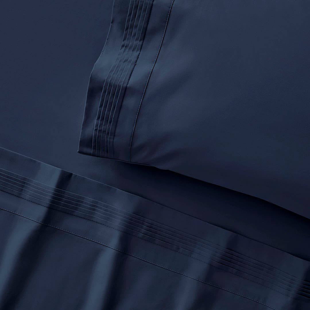 https://s3-ap-southeast-2.amazonaws.com/fusionfactory.commerceconnect.bbnt.production/pim_media/000/196/420/M_F_S23_Sleeping-Beauty_1200TC_Midnight-Navy_SS_Detail_SI.jpg?1750640340