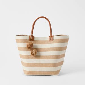 https://s3-ap-southeast-2.amazonaws.com/fusionfactory.commerceconnect.bbnt.production/pim_media/000/219/223/M_F_S26-27_Striped-Tote-w-Pom-Pom_Natural-White_20227803_0702_SI.jpg?1786688274