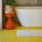 https://s3-ap-southeast-2.amazonaws.com/fusionfactory.commerceconnect.bbnt.production/pim_media/000/160/695/M_F_W24_LS_Bathroom_Runners_Braxton-Stone_V3_SI.jpg?1708490661