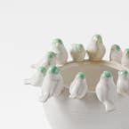https://s3-ap-southeast-2.amazonaws.com/fusionfactory.commerceconnect.bbnt.production/pim_media/000/205/600/M_F_W26_Birdsong-Ceramic-Vase_White-Green_26911401_Detail_SI.jpg?1765339663
