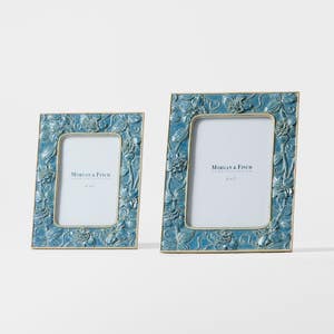 https://s3-ap-southeast-2.amazonaws.com/fusionfactory.commerceconnect.bbnt.production/pim_media/000/205/708/M_F_W26_Coventry-Photo-Frame_Range_Blue_26892_R_SI.jpg?1765343026