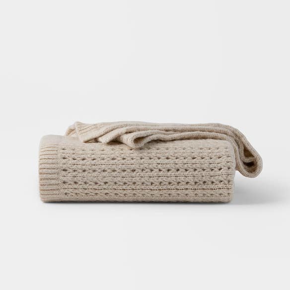 https://s3-ap-southeast-2.amazonaws.com/fusionfactory.commerceconnect.bbnt.production/pim_media/000/210/648/M_F_W26_Emmie-Knitted-Throw_Pumice_26938101_SI.jpg?1772588918