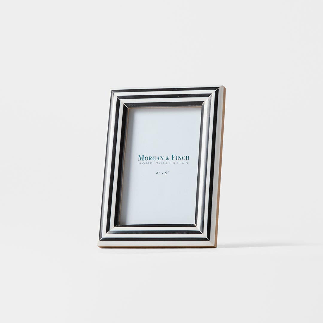 https://s3-ap-southeast-2.amazonaws.com/fusionfactory.commerceconnect.bbnt.production/pim_media/000/210/036/M_F_W26_Horgan-Resin-Frame-4x6_Navy-White_26906101_SI.jpg?1771221155