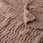 https://s3-ap-southeast-2.amazonaws.com/fusionfactory.commerceconnect.bbnt.production/pim_media/000/209/765/M_F_W26_Millen-Chunky-Knit-Throw_Mushroom_26900703_Detail-01_SI.jpg?1770868753