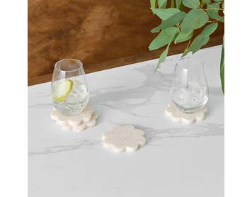 https://s3-ap-southeast-2.amazonaws.com/fusionfactory.commerceconnect.bbnt.production/pim_media/000/210/485/M_F_W26_Studio_LS_Napery_Scallop_Coaster_Resin_Seashell_SI.jpg?1772502817