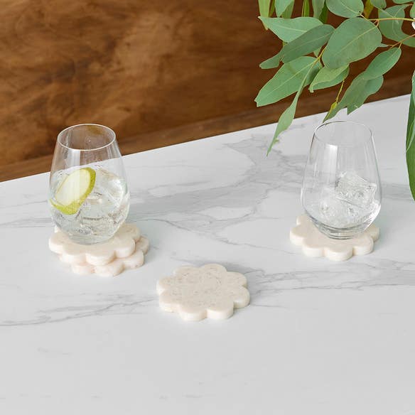 https://s3-ap-southeast-2.amazonaws.com/fusionfactory.commerceconnect.bbnt.production/pim_media/000/210/485/M_F_W26_Studio_LS_Napery_Scallop_Coaster_Resin_Seashell_SI.jpg?1772502817