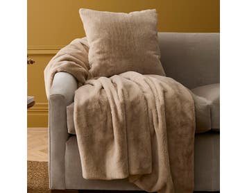 https://s3-ap-southeast-2.amazonaws.com/fusionfactory.commerceconnect.bbnt.production/pim_media/000/212/292/M_F_W26_Winter_Accessories_Fur_Throw_and_Cushion_Lumi_Faux_Fur_Stone_SI.jpg?1775007839
