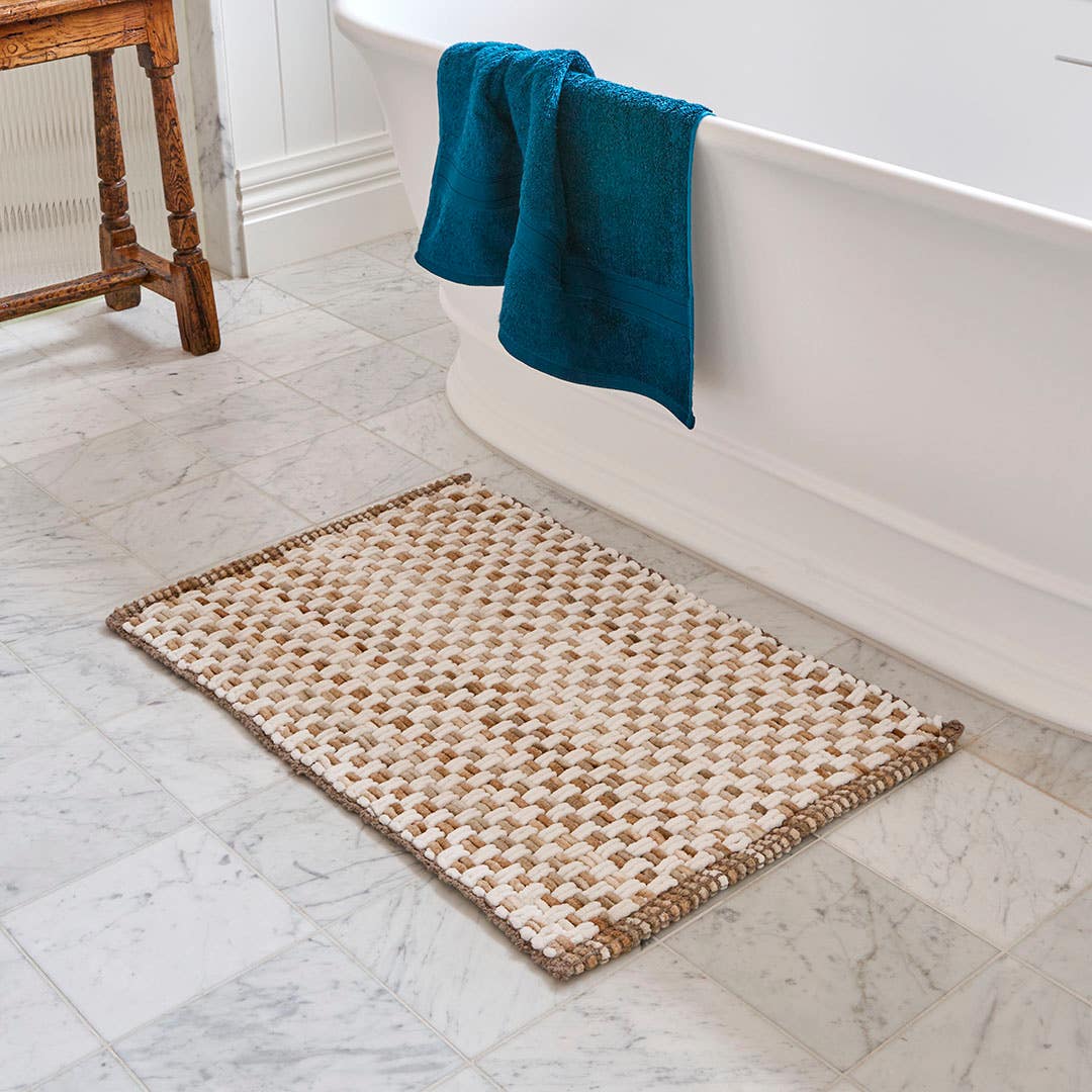 https://s3-ap-southeast-2.amazonaws.com/fusionfactory.commerceconnect.bbnt.production/pim_media/000/202/695/M_F_S25-26_Oli-Woven-Bathmat_Natural_26516803_SI.jpg?1759885180