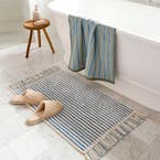 https://s3-ap-southeast-2.amazonaws.com/fusionfactory.commerceconnect.bbnt.production/pim_media/000/212/011/M_F_W26_Winter_Hampton_LS_Bathroom_Bathmat_Parker_Blue_Ivory_SI.jpg?1774826312