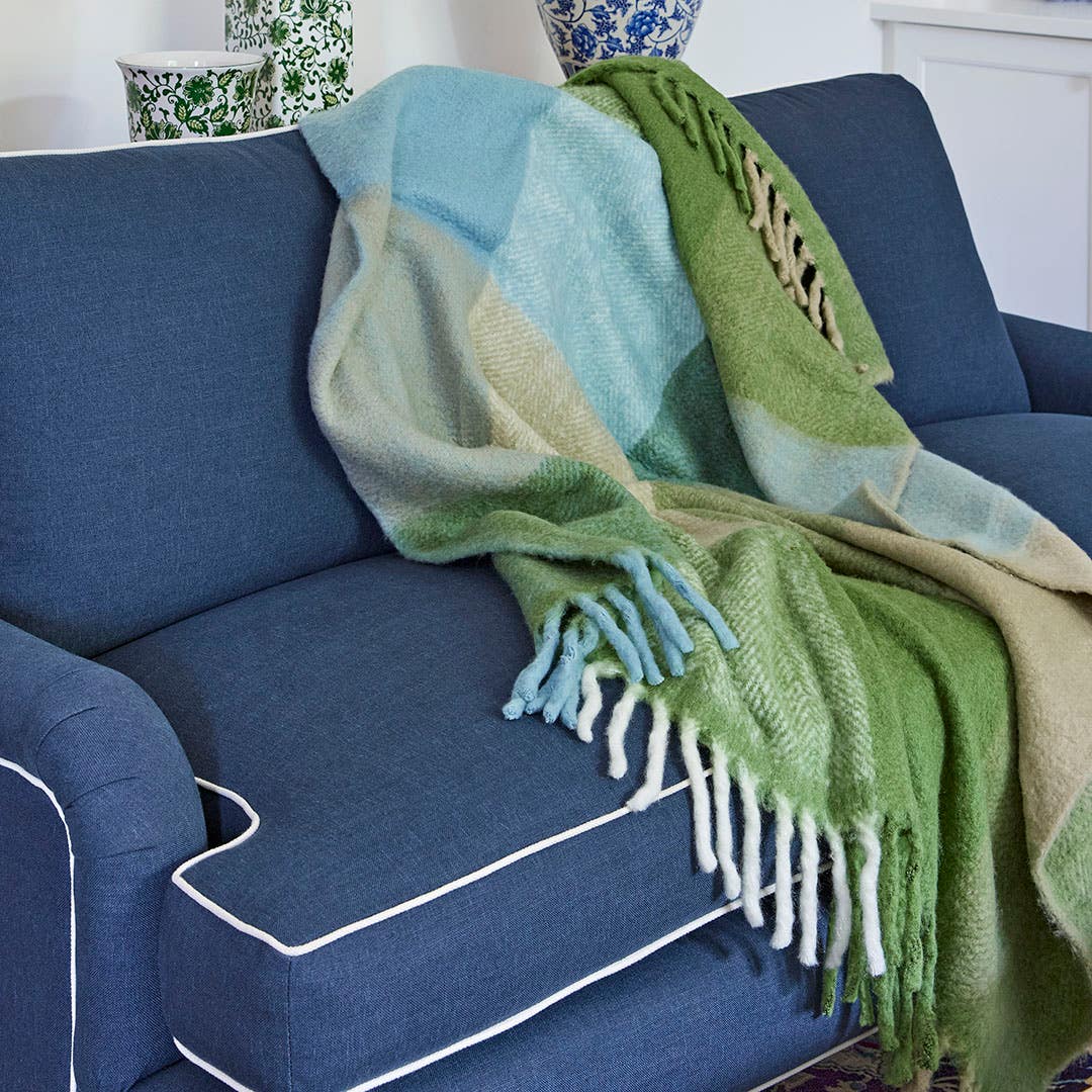 https://s3-ap-southeast-2.amazonaws.com/fusionfactory.commerceconnect.bbnt.production/pim_media/000/212/312/M_F_W26_Winter_Hampton_LS_Throws_Torben_Throw_Green-Light_Blue_SI.jpg?1775016431