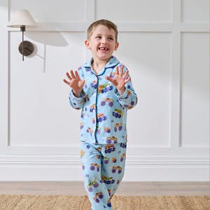 https://s3-ap-southeast-2.amazonaws.com/fusionfactory.commerceconnect.bbnt.production/pim_media/000/207/550/M_F_Winter_26_Studio_Kids_PJs-Flannel_Derby-Time-1_SI.jpg?1769488324