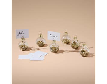https://s3-ap-southeast-2.amazonaws.com/fusionfactory.commerceconnect.bbnt.production/pim_media/000/216/989/M_F_Xmas-26-27_CG_XMAS_DINING_Glass-Ball-Place-Card-Holder-S6-Gold_26301301_V2_SI.jpg?1783905440