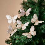 https://s3-ap-southeast-2.amazonaws.com/fusionfactory.commerceconnect.bbnt.production/pim_media/000/213/429/M_F_Xmas-26-27_HT_Decs_Set_S6-Feather-Butterfly-on-Clip-Ivory-Gold_22168401_SI.jpg?1778825831