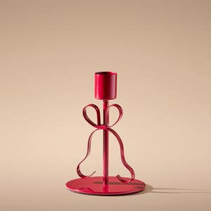 https://s3-ap-southeast-2.amazonaws.com/fusionfactory.commerceconnect.bbnt.production/pim_media/000/214/676/M_F_Xmas-26-27_MR_CANDLEHOL_Ribbon-Taper-Candle-Holder-Sml-Red_26226401_SI.jpg?1781503732