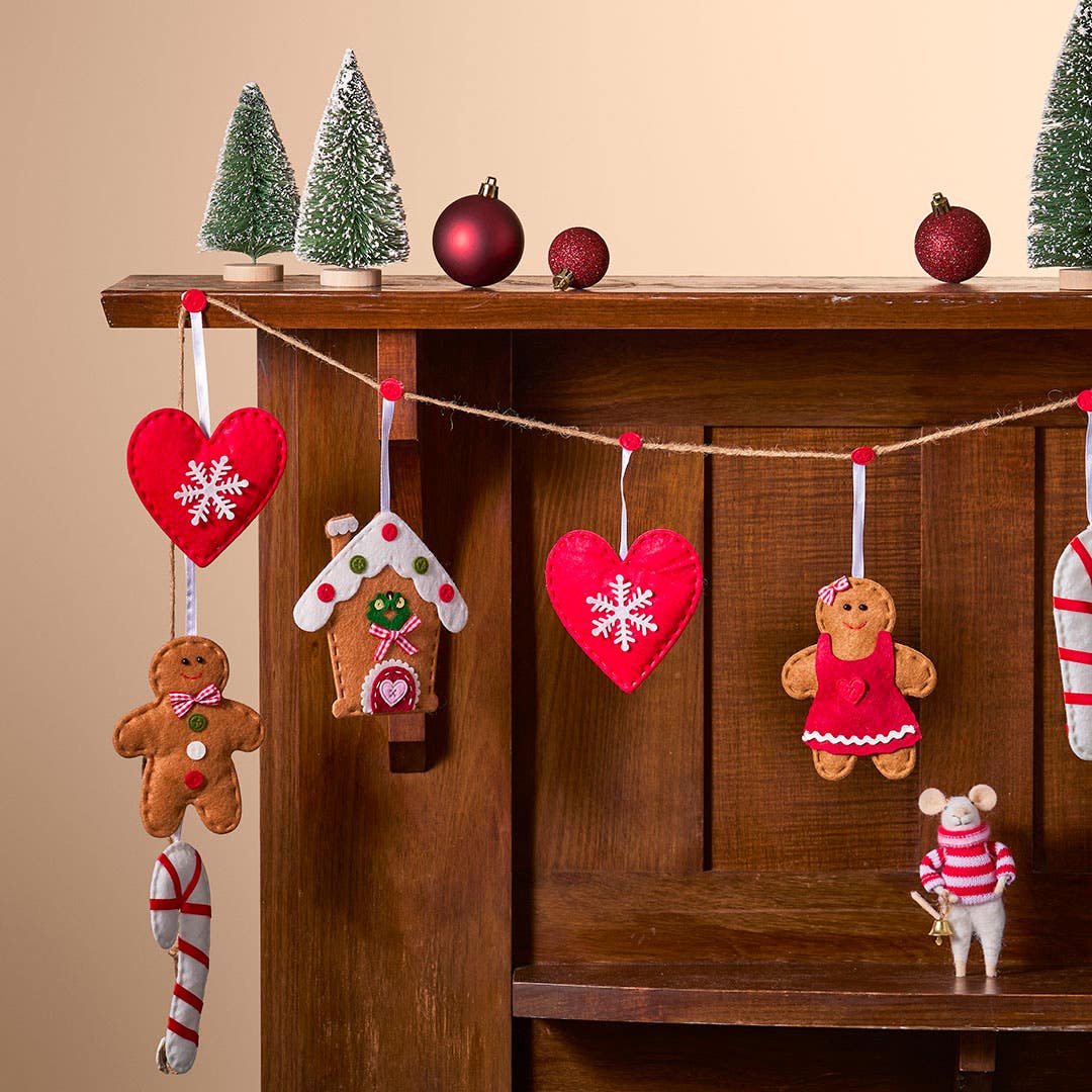 https://s3-ap-southeast-2.amazonaws.com/fusionfactory.commerceconnect.bbnt.production/pim_media/000/213/593/M_F_Xmas-26-27_MR_GARLAND_Gingerbread-House-Garland-Red_22599701_SI.jpg?1779150525