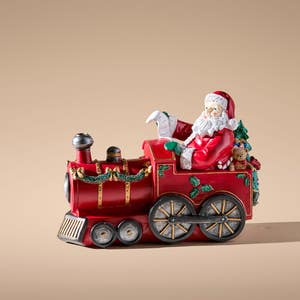 https://s3-ap-southeast-2.amazonaws.com/fusionfactory.commerceconnect.bbnt.production/pim_media/000/214/738/M_F_Xmas-26-27_MR_STAND_DECS_Resin-Santa-on-Christmas-Train_27116201_SI.jpg?1781506158